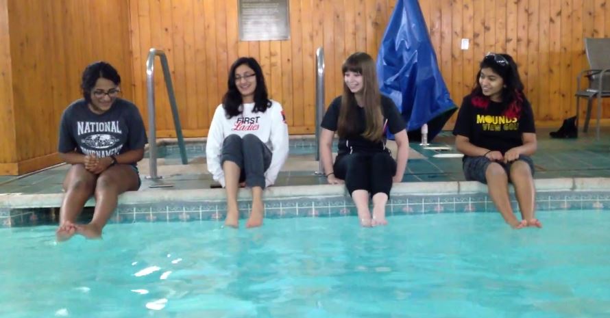 Nancy, Sabriyah, Charlotte, and Heeral at the pool