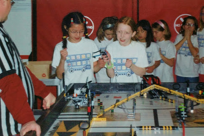 Old photo: team cheering on their LEGO robot